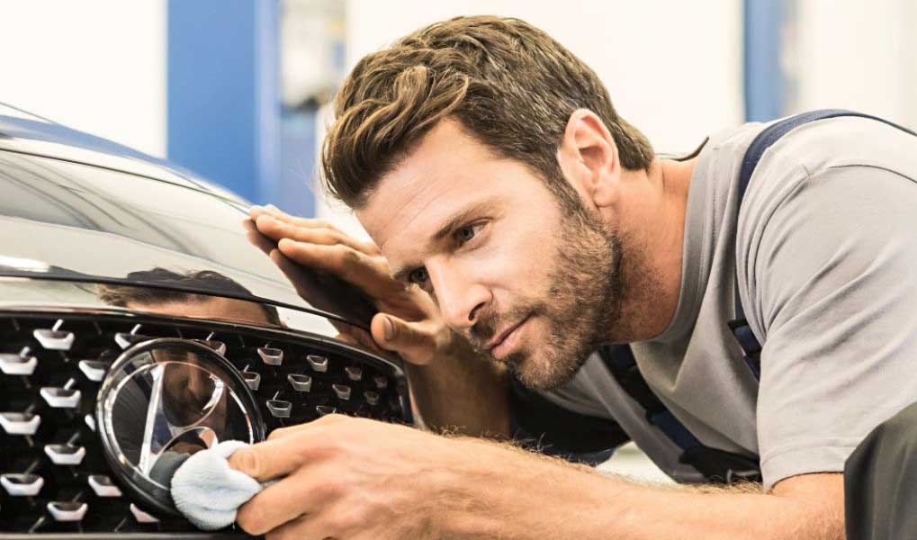 A car mechanic performs thorough maintenance on the Hyundai Auto Abo.